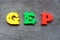 Color plastic alphabet in word GEP abbreviation of good engineering practice on wood background