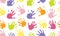 Color prints of children hands, seamless pattern. Vector illustration