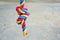 Color rope knot, three colors red, blue, yellow. The concept of bondage, connection, relationship pull the rope