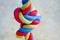 Color rope knot, three colors red, blue, yellow. The concept of bondage, connection, relationship pull the rope