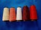 Color Sewing Threads, Stitching Threads on Non Woven Fabric Background