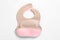 Color silicone baby bibs isolated on white, top view