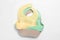 Color silicone baby bibs isolated on white, top view