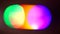 Color spots of matrix illumination in bokeh effect on a black background.