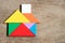 Color tangram puzzle in house shape