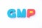 Color toy foam alphabet in word GMP Abbreviation of Good Manufacturing Practice