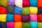 Color wool background - balls of synthetic wool yarn