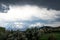 Colorado snow covered mountain, and an overcast dark grey sky