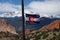 Colorado State Flag with Pikes Peak and Garden of the Gods in th