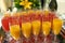 Colored aperitifs in glass glasses