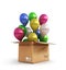 Colored balls in a cardboard box for deliveries on whit