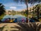 Colored boats for the lake tour at huacachina oasis in peru, palm trees surround the oasis and sand dunes on the background