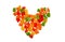 Colored candied fruits laid out in the shape of a heart