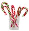 Colored candy sticks and Christmas lollipops in a transparent glass, isolated, white background.