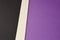 Colored carboards background in black beige purple tone. Copy sp