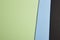 Colored carboards background in green, blue, black tone. Copy sp