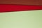 Colored cardboards background in green red brown tone. Copy spac