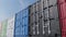 Colored cargo containers against blue sky, shallow focus. 3D rendering