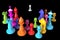 Colored chess. White pawn against chess in the colors of the rainbow or the LGBT community