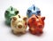Colored children`s piggy Bank on white background