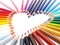 Colored crayons show heart-shape