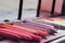 colored crayons, various colors of crayons on a wooden table with natural light and background window, diversity