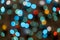 Colored Defocused Christmas Lights Background. Abstract bokeh lights