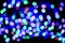 Colored defocused lights background. Abstract bokeh lights