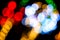 Colored defocused lights background. Abstract bokeh lights