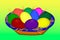 Colored easter eggs laying in a basket. Painted eggs. Colored Easter Eggs