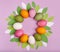 Colored Easter eggs wreath. Spring greeting card banner with traditional Easter symbols