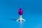 .Colored easter plastic egg on a stand in the form of a rocket