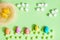 Colored eggs, easter concept, green background. Grass paper background. Spring april greeting card.