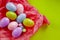 Colored eggs and small fluffy clumps as a symbol of Easter. eggs made of  foamiran.