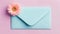 Colored envelope with colorful flower on bright pastel colored background