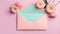 Colored envelope with colorful flower on bright pastel colored background