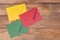 Colored envelopes on wooden table. Concept holidays, communications. Business mail, blogging and office correspondence background.