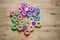 Colored fidget spinners stress relieving toy on wooden background