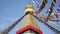 Colored flags fly near Boudha Bouddhanath or Baudhanath stupa in Nepal