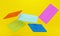 Colored flying credit cards on yellow background. 3d rendering