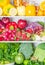 Colored full fridge with fruit and vegetables