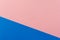 Colored geometric blue and pink paper texture background.