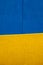 Colored and geometric concrete walls, blue and yellow. Details of concrete buildings