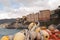 Colored houses in the coast of Camogli with a fisherman`s networ