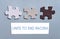 Colored Jigsaw Puzzle pieces on gray background top view. Concept for Unite to end racism, All colors are beautiful