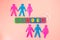 Colored letters gender with symbols and silhouettes of man and woman on pink background
