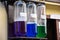 Colored liquids in three test tubes. pharmacy or medical store decor. outdoor