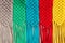 Colored macrame stripes in blue, yellow, red, beige, green and pink colors