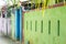 Colored maldivian house with a green wall with windows