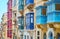 Colored Maltese balconies of Republic street, Valletta, Malta